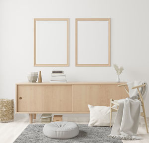 Table and chairs against wall at home