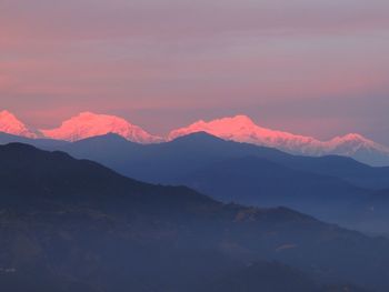 Scenic view of mountains against sky during sunset