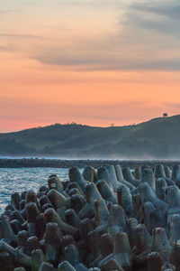 Scenic view of sea against sky during sunset