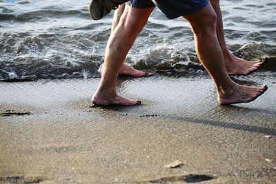 Low section of man on beach