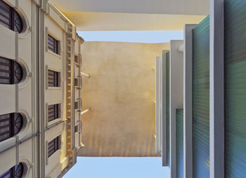 Low angle view of buildings against sky in city