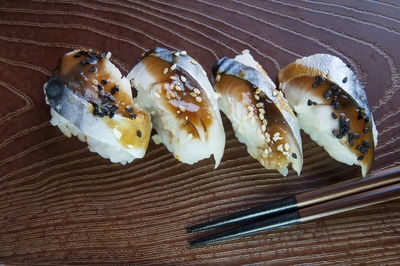 High angle view of sushi served on table