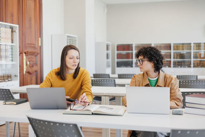 Businesswoman working on table