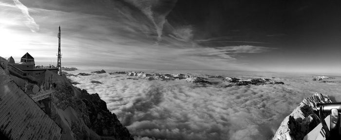 Idyllic shot of clouds over snowcapped mountains seen from zugspitze against sky