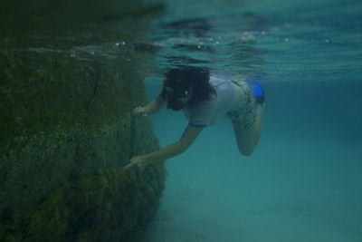 Woman snorkeling in sea