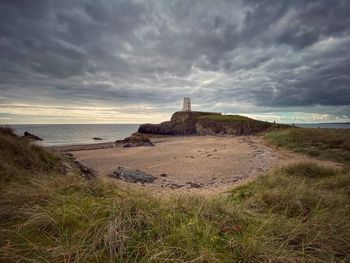Scenic view of beach against sky