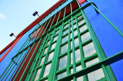 Low angle view of building against blue sky