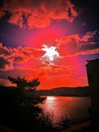 Scenic view of sea against dramatic sky