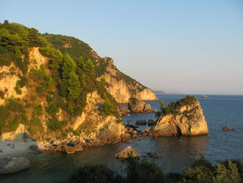 Scenic view of calm sea against clear sky