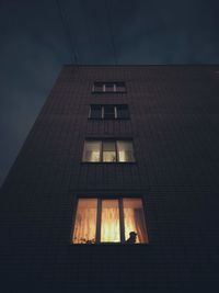 Low angle view of building against sky at night