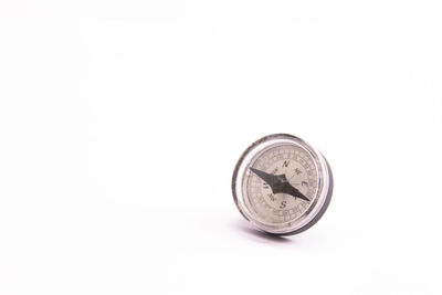 Close-up of clock against white background