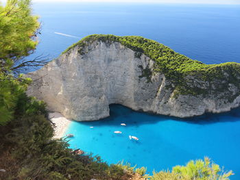 High angle view of rocks by sea