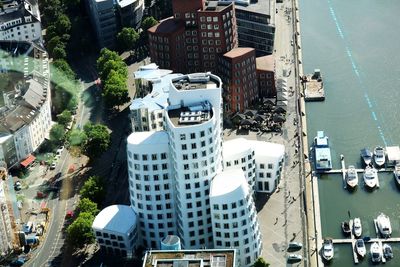 High angle view of cityscape by sea