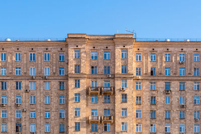 Low angle view of building against blue sky