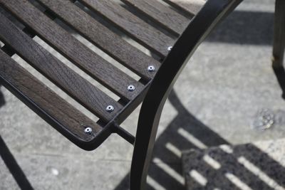 High angle view of railing on bench