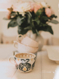 Close-up of tea cup on table