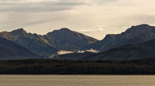 Scenic view of mountains against sky during sunset