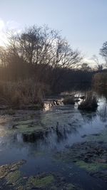 Scenic view of river against sky