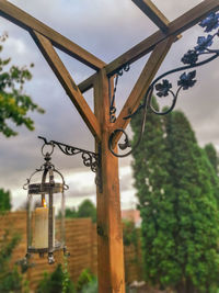 Low angle view of wooden structure against sky