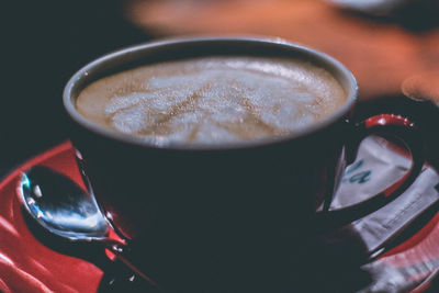 Close-up of cappuccino on table