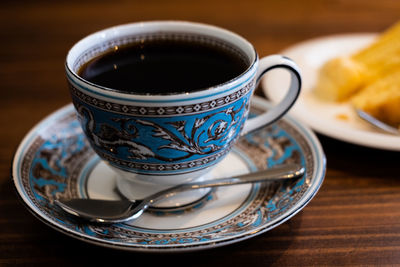 Close-up of coffee cup on table