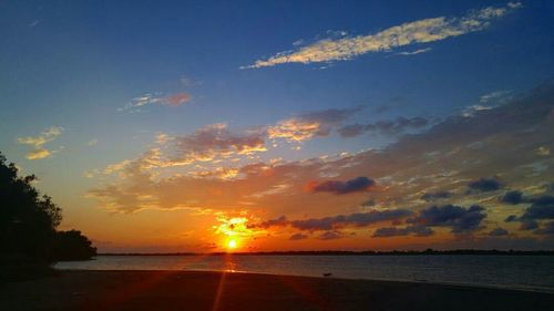 Scenic view of sea at sunset