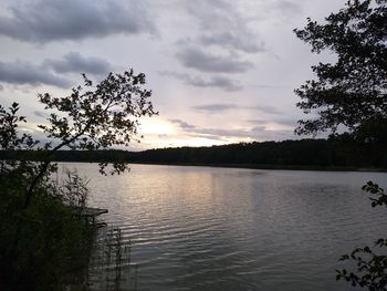 Scenic view of lake against sky during sunset