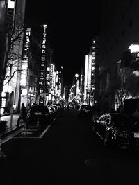 Buildings in city at night