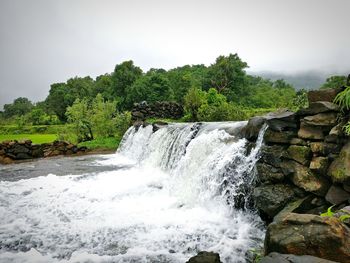 River flowing through rocks