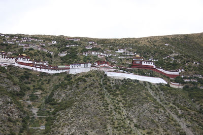 High angle view of buildings against sky