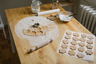 Young woman making christmas cookies