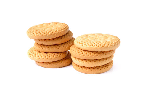 Close-up of cookies against white background