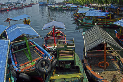 High angle view of boats moored in water