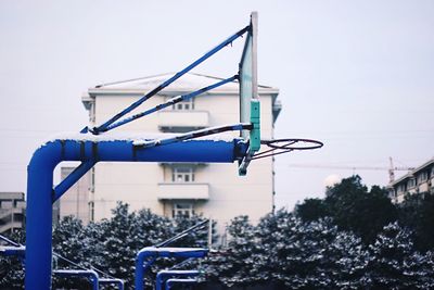 Low angle view of basketball hoop during winter