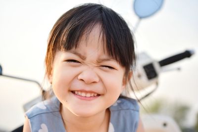 Close-up portrait of smiling girl