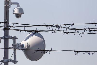 Low angle view of street light against clear sky