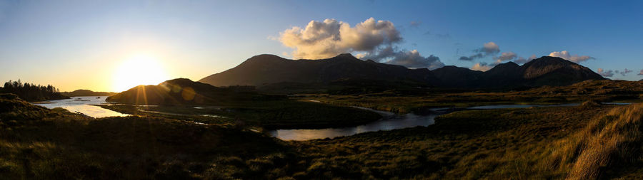 Panoramic view of lake against sky during sunset