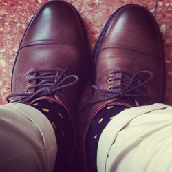 Low section of person wearing shoes
