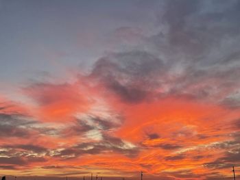 Low angle view of dramatic sky during sunset