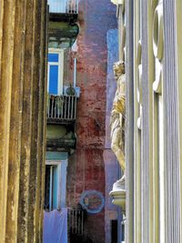 Statue of old building in city