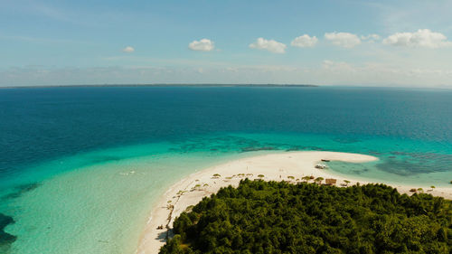Tropical landscape small island with beautiful beach, palm tree. patawan island with sandy beach. 
