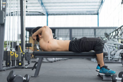 Man exercising in gym