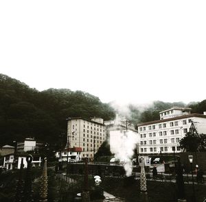 Buildings against clear sky