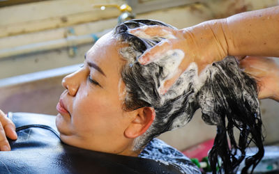 A woman close-up in a beauty salon.