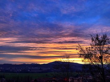 Scenic view of dramatic sky during sunset