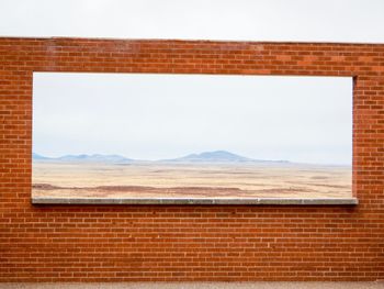 Close-up of wall against sky