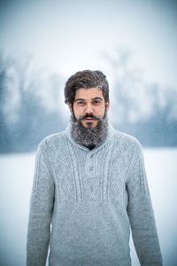 Portrait of bearded young man during winter