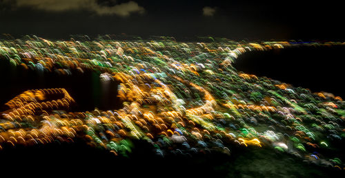 Illuminated fountain at night