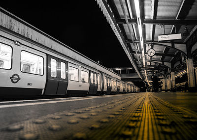 Train at railroad station at night