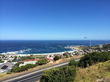 High angle view of road leading towards sea